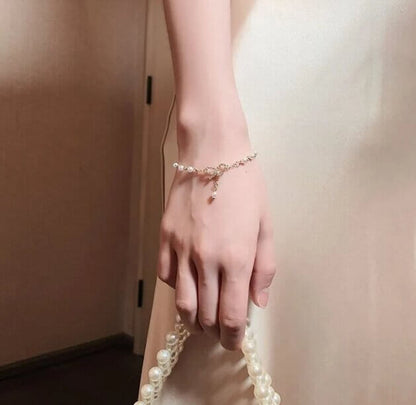 Pearl Bow Charm Bracelet
