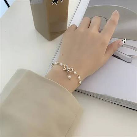 Pearl Bow Charm Bracelet